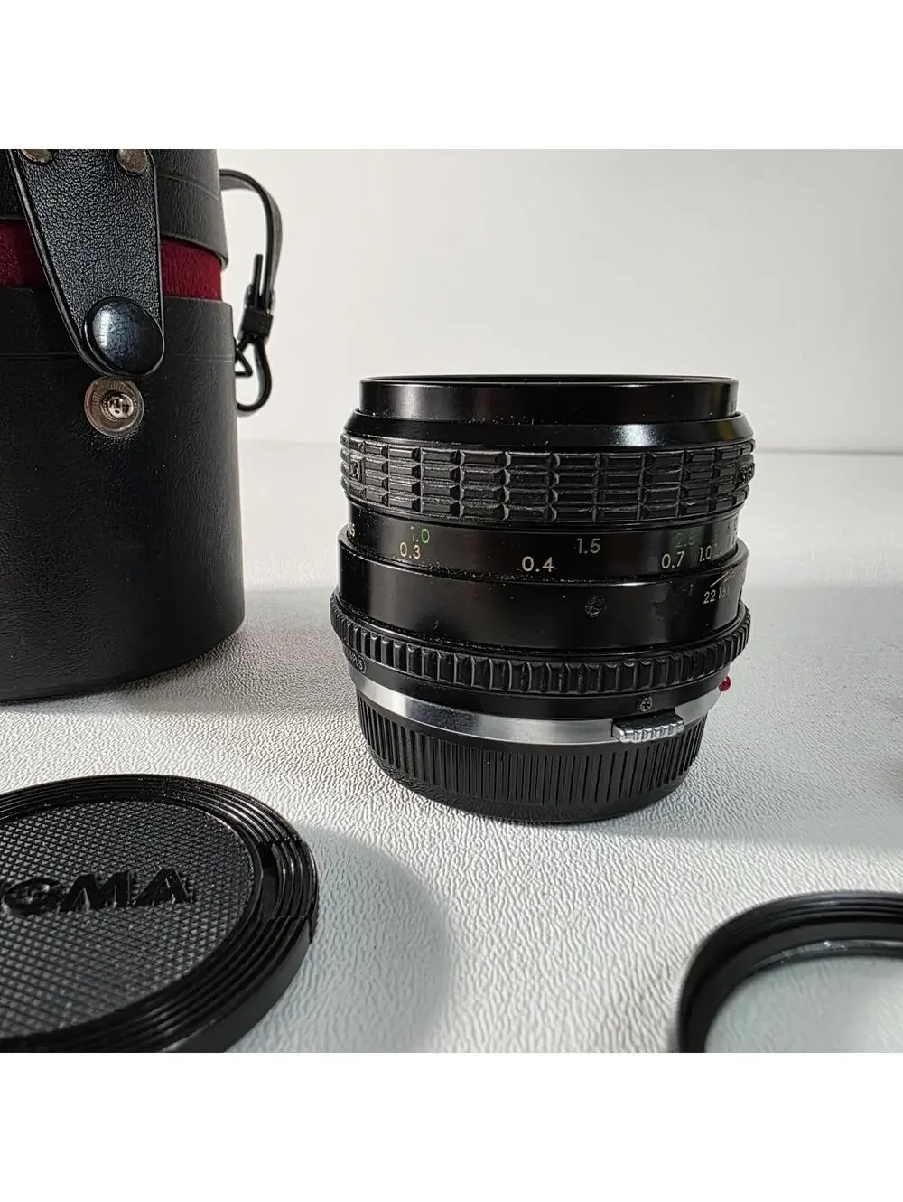 SIGMA 28mm f/ 2.8 lens mini wide, OLYMPUS OM Mount W/Case, Caps & Hood